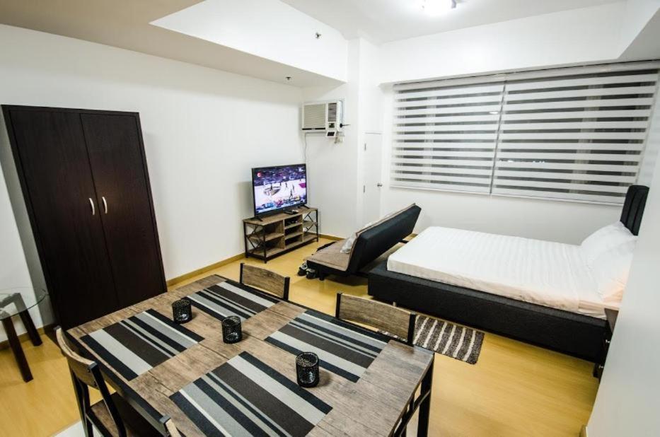 Prime Avant Bgc Location Apartments By Ph Staycation Manila Eksteriør billede
