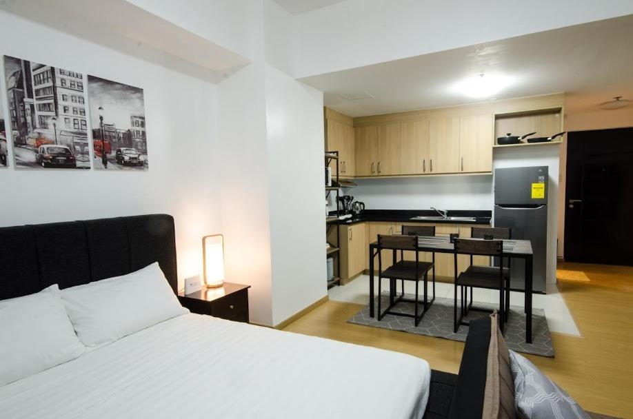 Prime Avant Bgc Location Apartments By Ph Staycation Manila Eksteriør billede