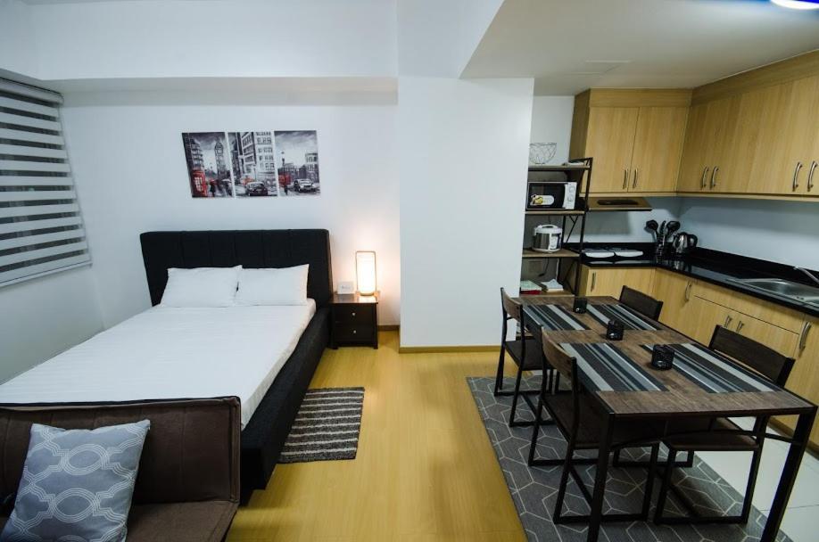 Prime Avant Bgc Location Apartments By Ph Staycation Manila Eksteriør billede