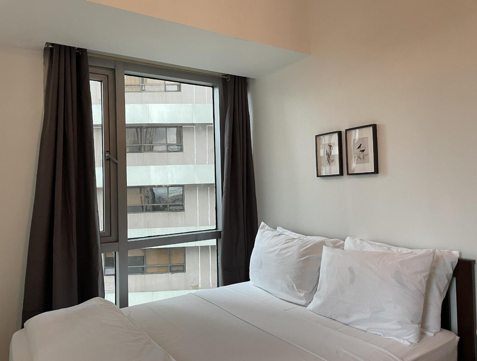 Prime Avant Bgc Location Apartments By Ph Staycation Manila Eksteriør billede